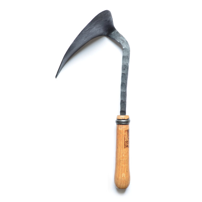 Hand-forged large weeding hoe with a curved dark steel blade and light wooden handle, displayed on a clean white background in a minimalist artisan gardening tool presentation.