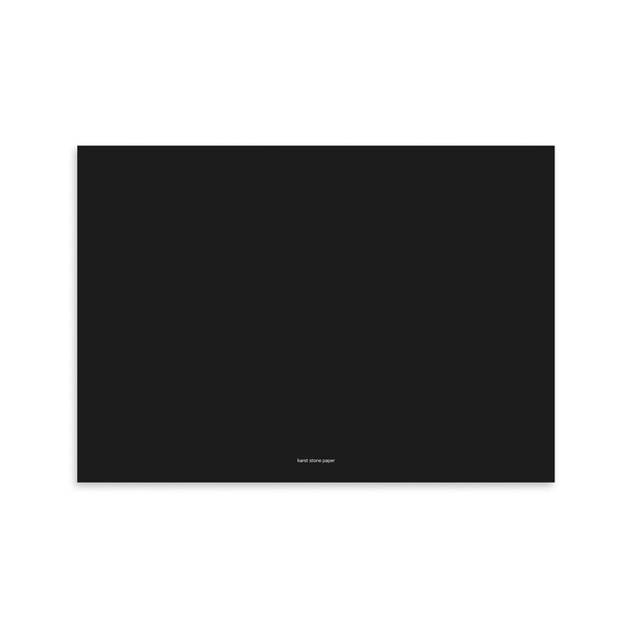 Back cover of the Karst Stone Paper Sketchpad in solid black, featuring subtle ‘karst stone paper’ branding at the bottom, shown on a white background.