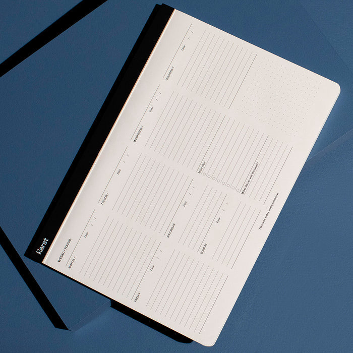 Karst A4 Stone Paper Weekly Desk Pad planner with minimalist weekly layout for scheduling, task planning, and productivity, eco-friendly tree-free desk planner made from recycled stone paper.