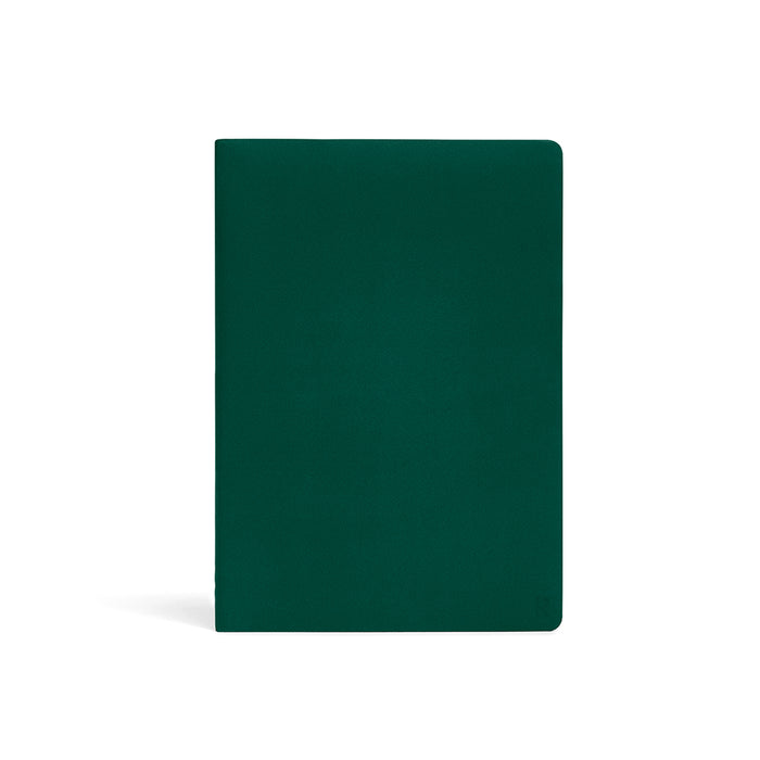 Karst Stone Paper Notebook A5 in forest green, featuring a minimalist soft-touch cover with rounded corners on a white background.