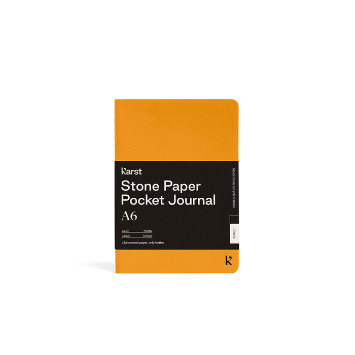 Yellow pocket journal with black label on a white background