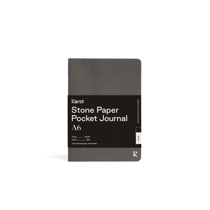Gray pocket journal with 'karst' branding on a white background