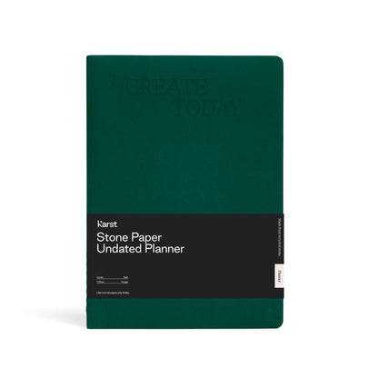 Front view of a forest green Karst Stone Paper Undated Planner notebook with “Create Today” embossed on the cover and a black band labeled “Stone Paper Undated Planner,” displayed on a white background.