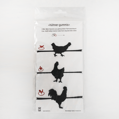 Pack of black chicken-shaped rubber bands made from recycled bicycle inner tubes, playful farm animal organizers for office supplies, gift wrapping, and household use.