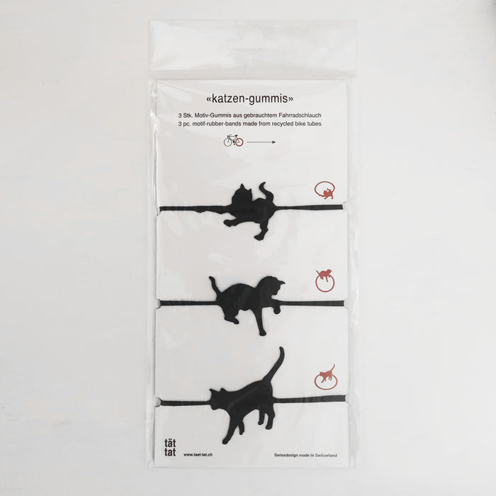 Pack of black cat-shaped rubber bands made from recycled bicycle inner tubes, playful animal organizers for office supplies, gift wrapping, and everyday household use.