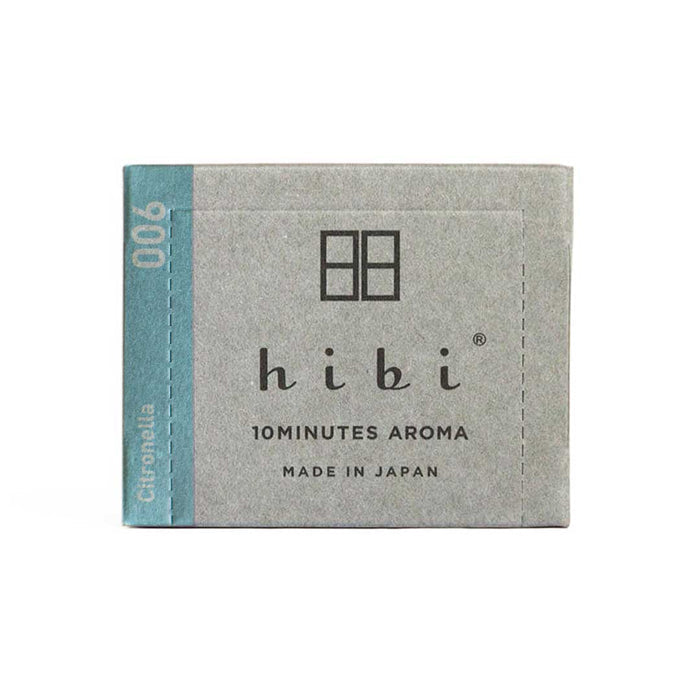 Open hibi 10 Minutes Aroma incense matchbox displaying black incense matches inside the packaging on a white background.