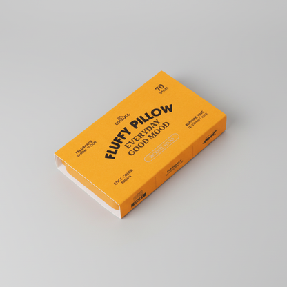 Warm yellow Collins Everyday Good Mood incense box labeled “Fluffy Pillow,” sandalwood-scented incense sticks in bold modern packaging on a clean white background.