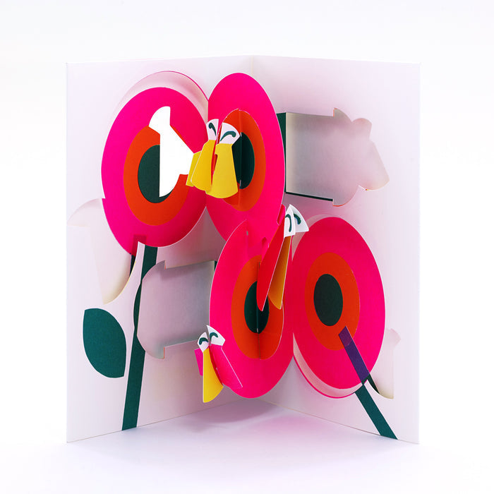 Open 3D pop-up greeting card featuring bright pink flowers with colorful butterflies in a bold modern paper art design, perfect for birthdays, spring celebrations, and special occasions.
