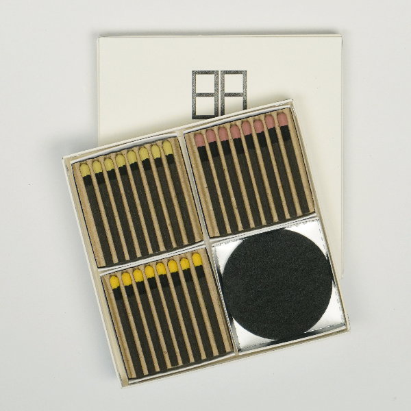Open Hibi 10 Minutes Aroma incense matches gift box showing assorted Japanese incense matches and black burning mat.