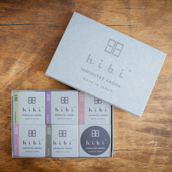 Hibi 10 Minutes Aroma assorted incense matches gift box opened on wooden surface, featuring six Japanese incense scents in minimalist packaging.