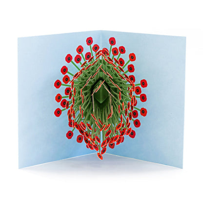 Open 3D pop-up greeting card featuring a sculptural bouquet of red poppy flowers with intricate green paper stems on a pale blue background, elegant floral paper art for special occasions.