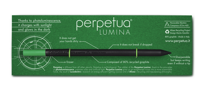 Perpetua Lumina black recycled graphite pencil with green photoluminescent eraser shown in branded packaging, eco-friendly Italian pencil designed to glow in the dark after sunlight exposure.