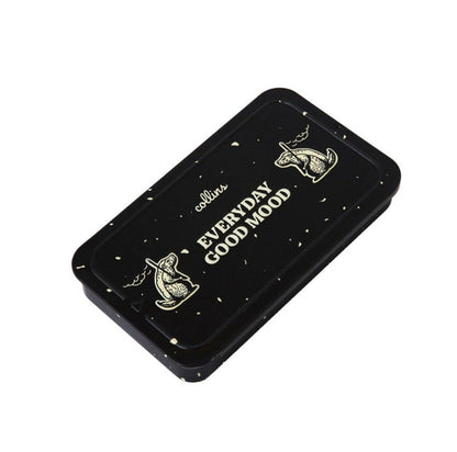 Black Collins Everyday Good Mood incense tin with playful illustrated graphics and speckled detailing, compact minimalist storage case for modern home fragrance and incense accessories.