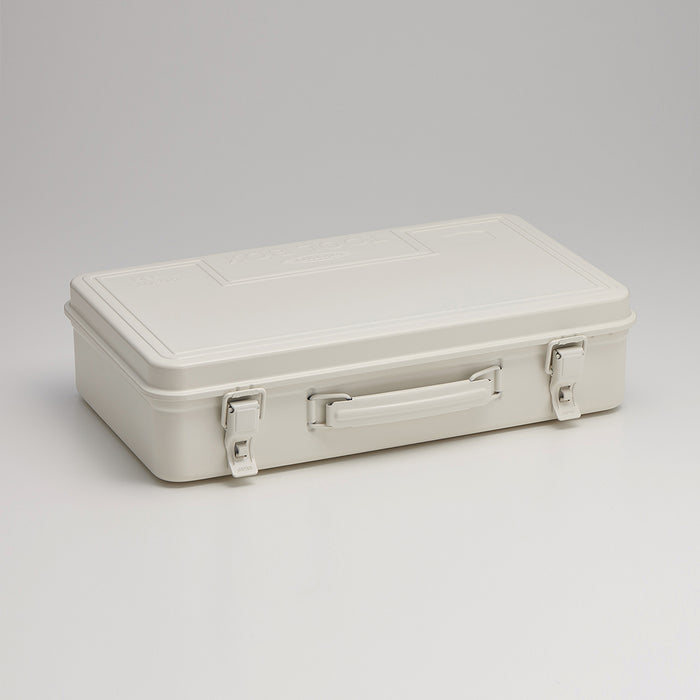 white Toyo steel toolbox with handle and dual metal latches, shown closed on a neutral background.